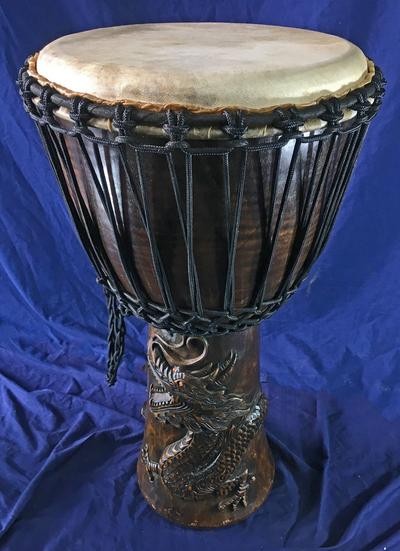 Djembe, Carved