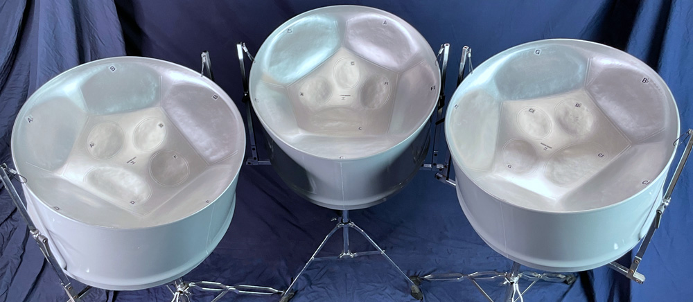 Triple cello steel pans, painted